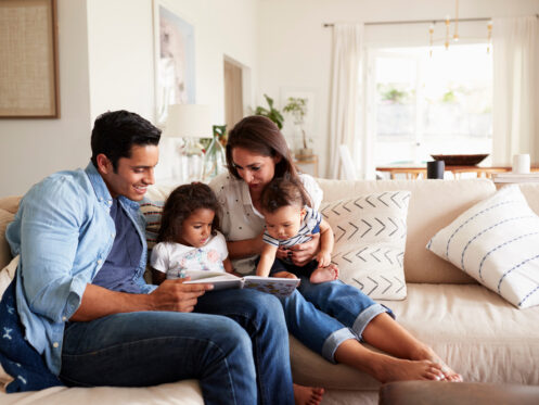 Reading time for a young family in their El Paso home.
